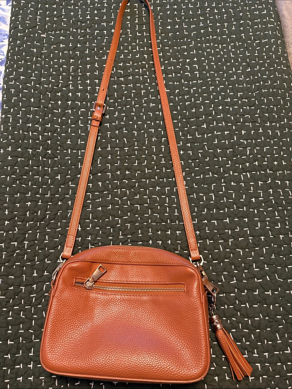 Pebbled Leather Crossbody Bag in Cognac with Tassel Accent